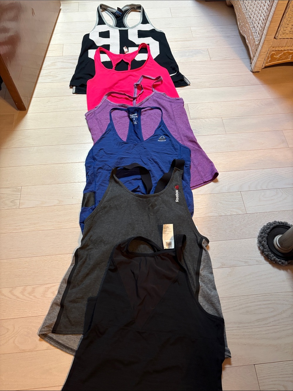 Workout tank bundle. Brands: Reebok under armor and Nike